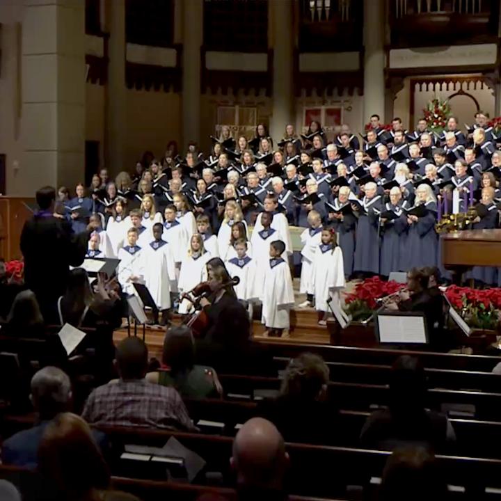 combined choirs and congregation singing in worship