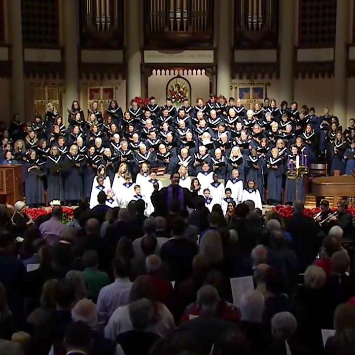 combined choirs and congregation singing in worship
