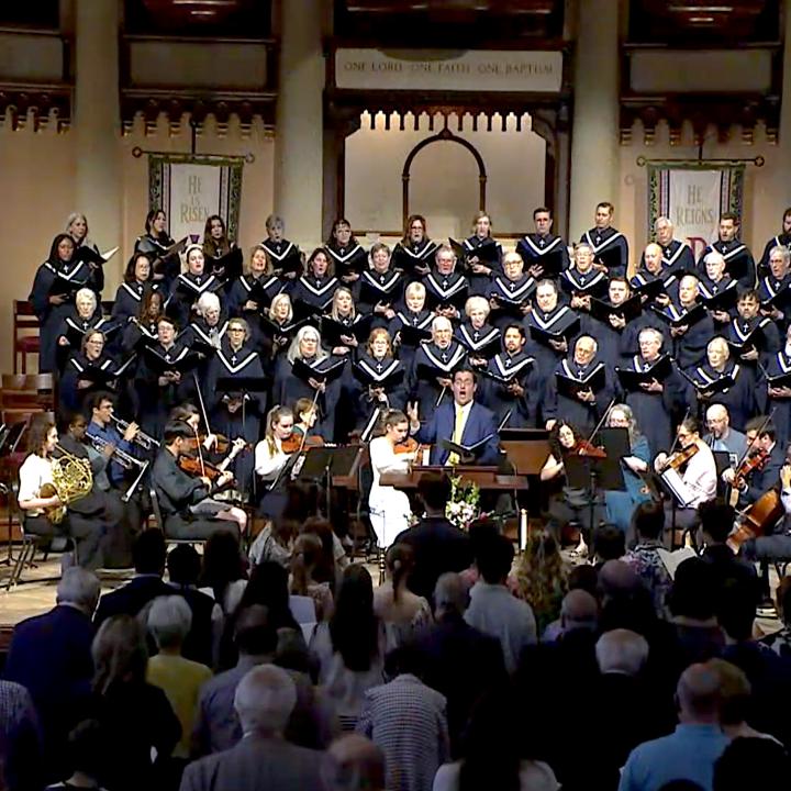 sanctuary choir and congregation singing in worship