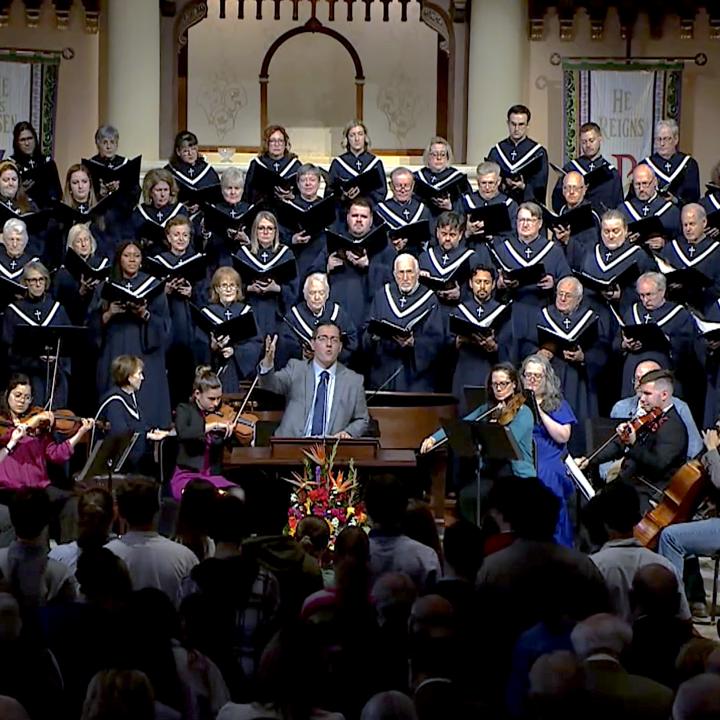 sanctuary choir and congregation singing in worship