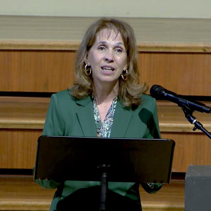 Dolores Rader addressing the congregation during her sermon