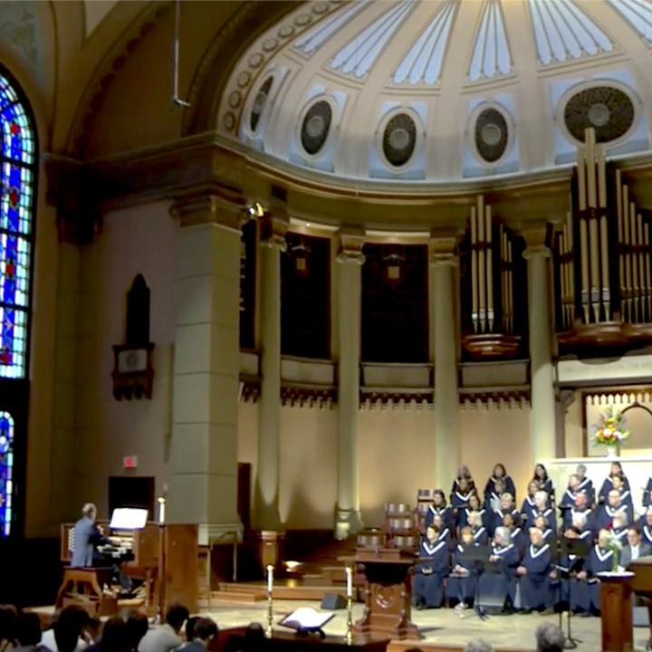 choir and congregation sitting in the sanctuary