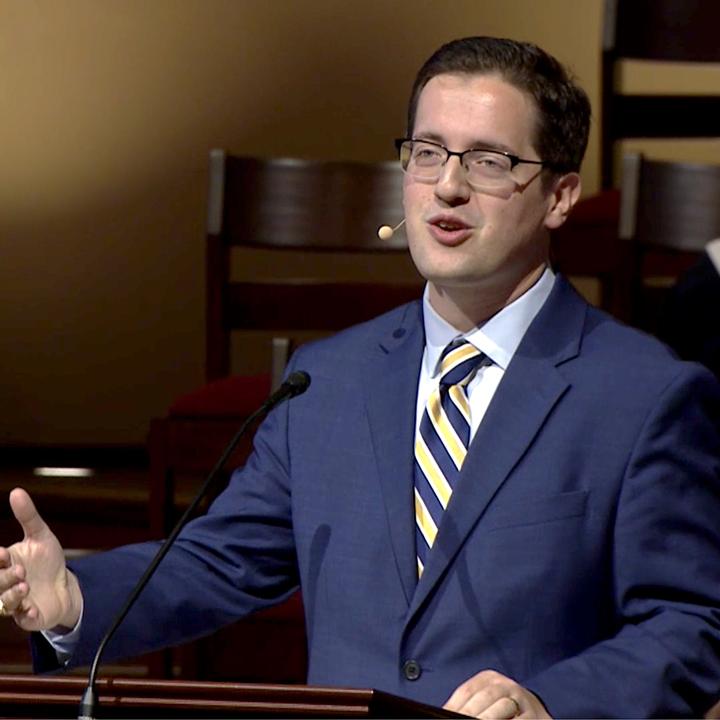 Adam cogliano addressing the congregation during his sermon