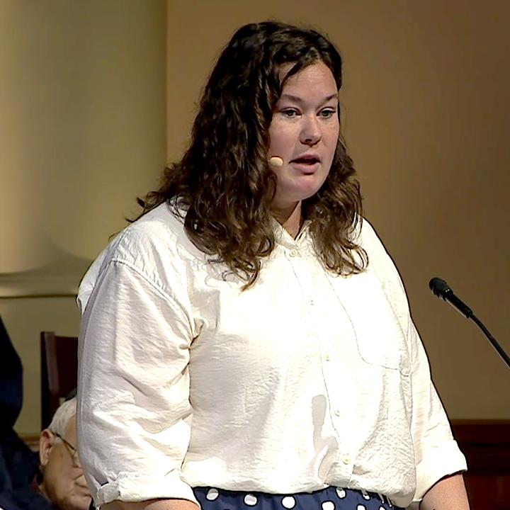 alyssa carter addressing the congregation during her sermon