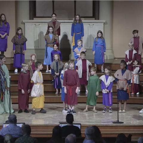 The 527 Tribe and MainKids in biblical times costumes presenting their musical
